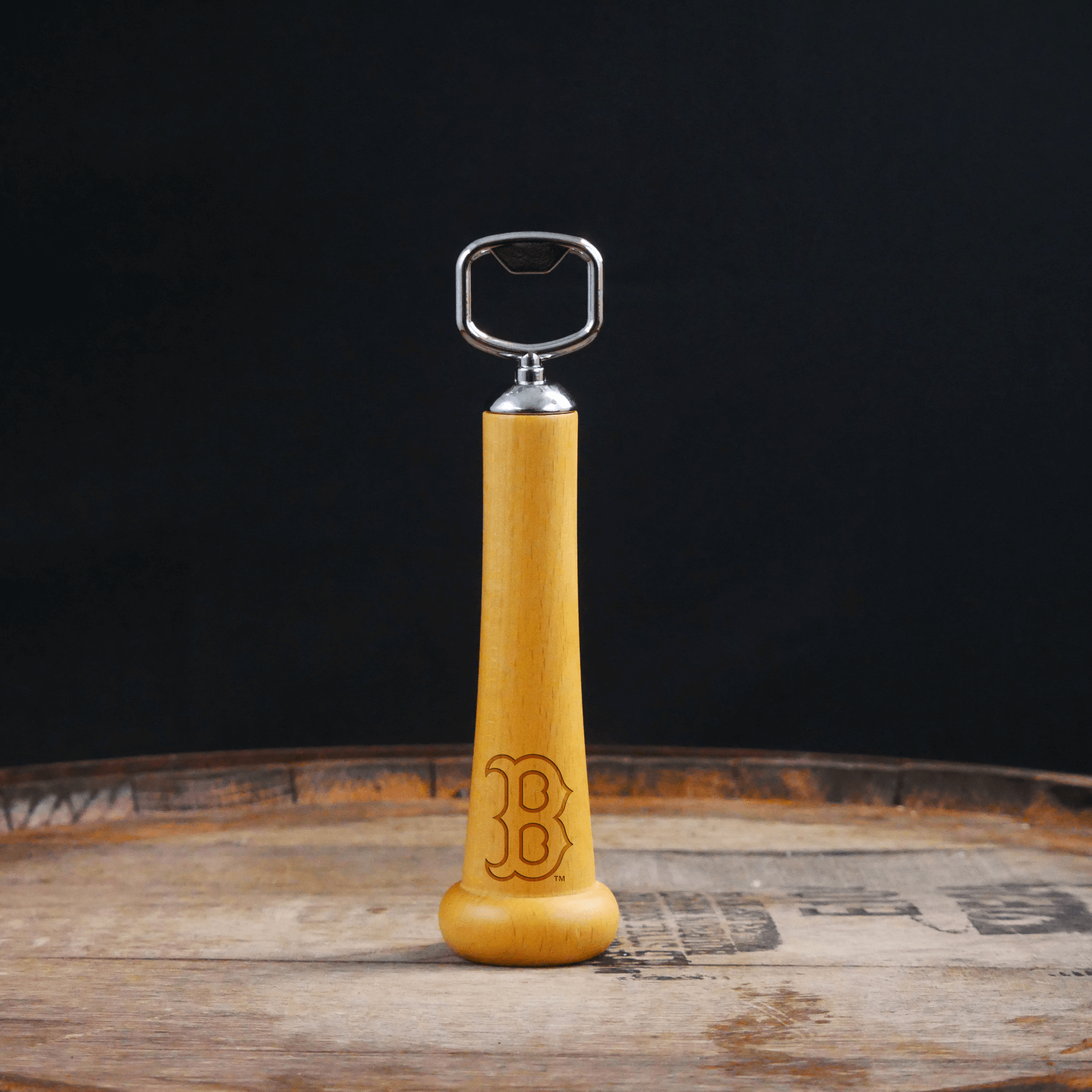 Collection of Wooden bottle opener with metal cap catcher on a wooden surface in a gallery layout